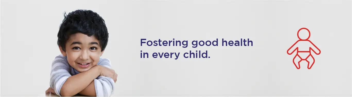 Young smiling child with text promoting pediatric health at Sriram Hospital, KR Puram, Bangalore