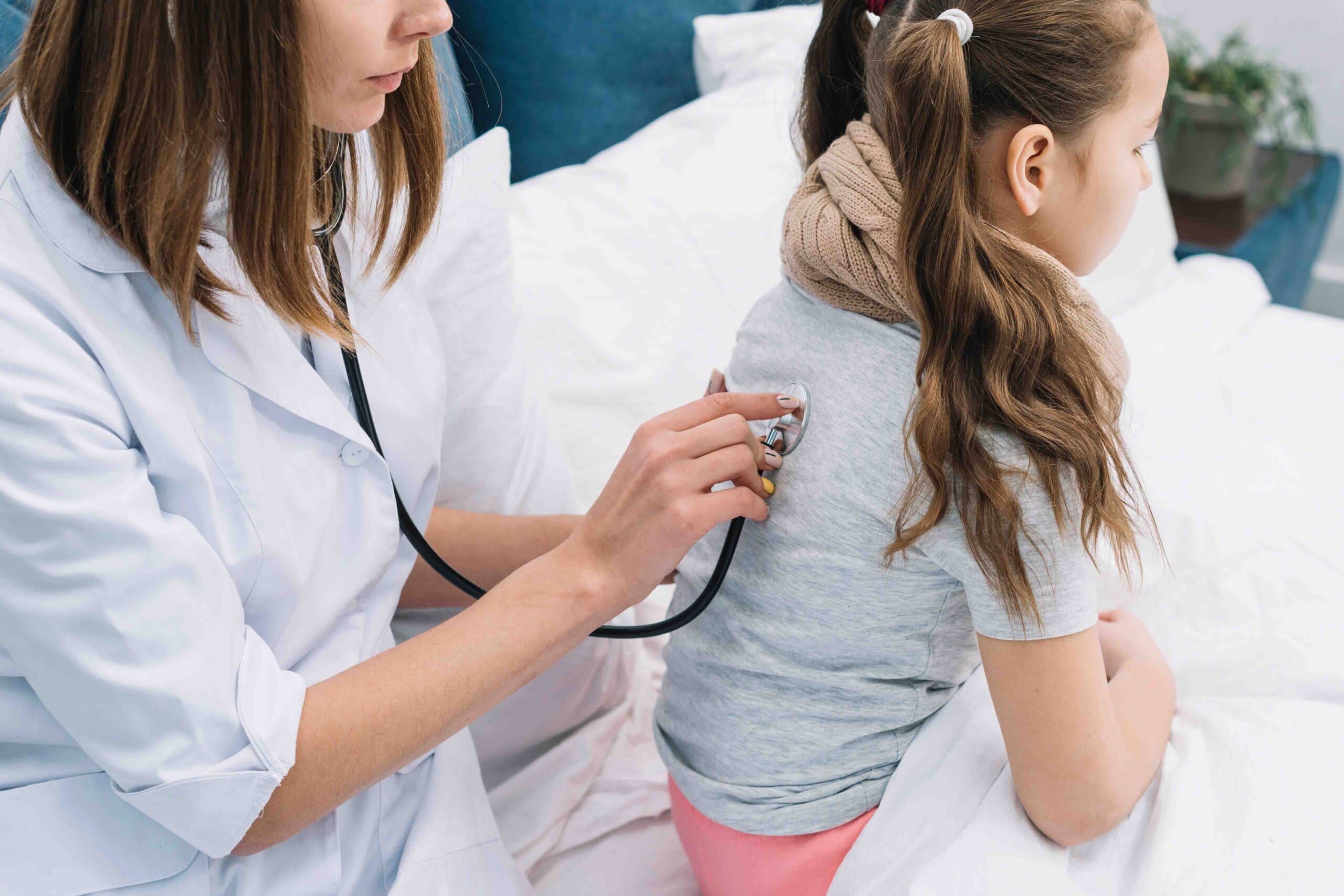 doctor checking a kid